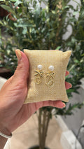 Cd bow earrings