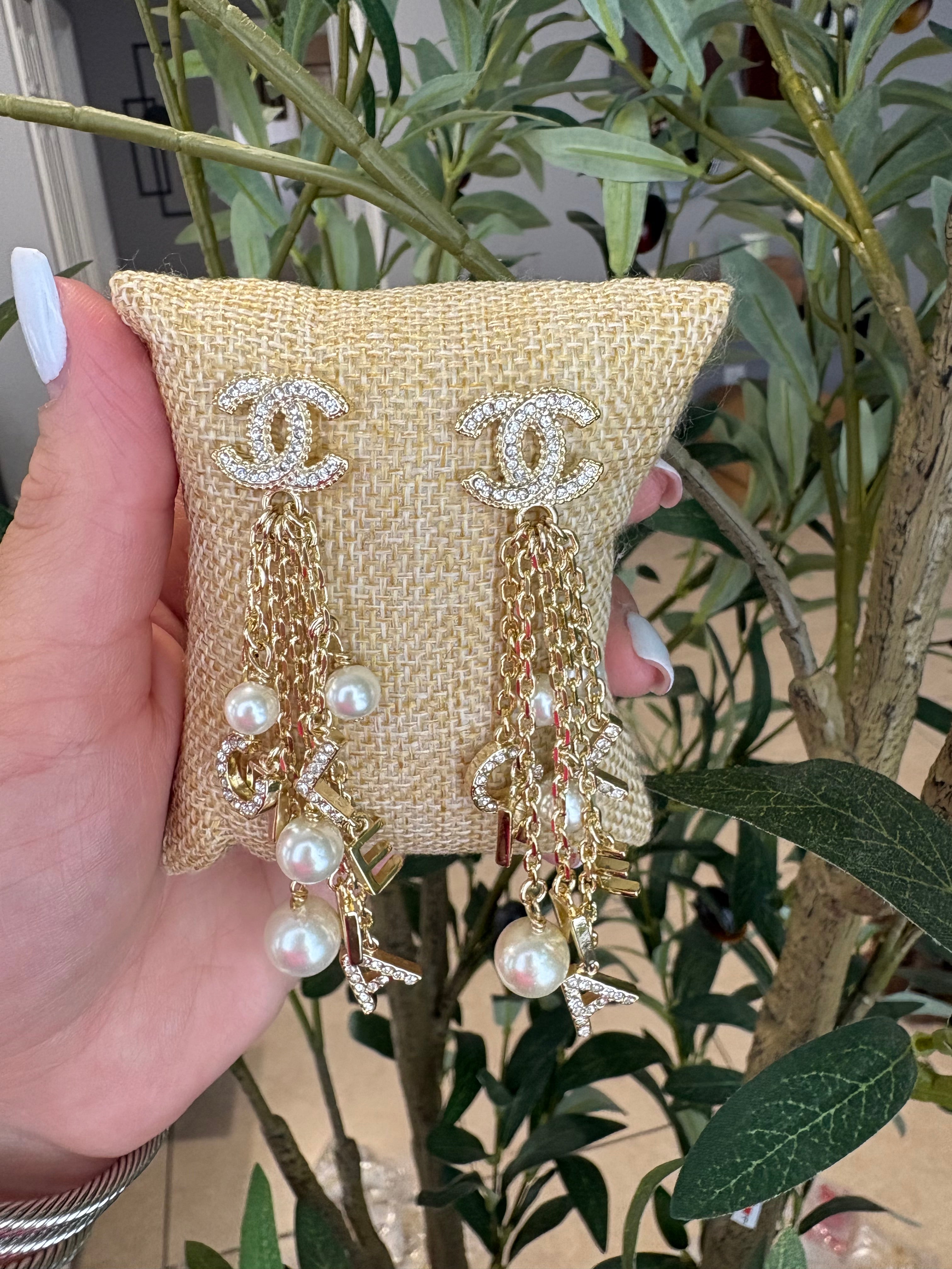 Cc long earrings